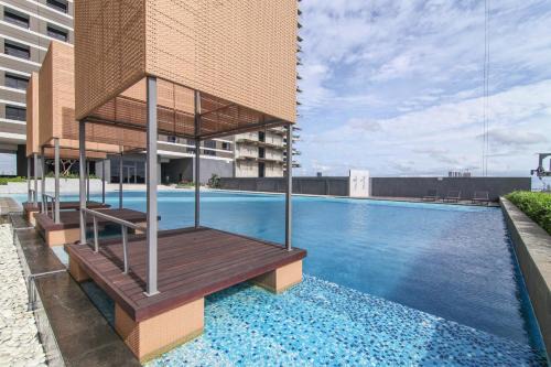 Pinang Apartment | 2BR Collins 1535 W Pool & Playstation 5