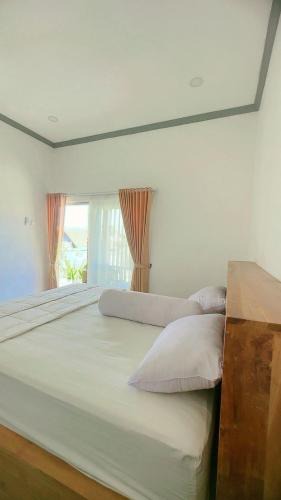 Kutuh House | Bay In Guest House