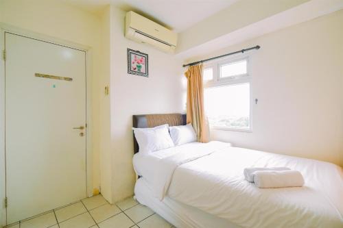 Rawasari Apartment | Best Price and Comfortable 2BR Green Pramuka City Apartment By Travelio