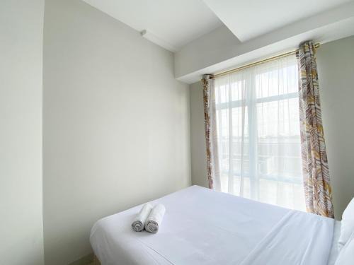 Cikarang Apartment | Cozy Stay 1BR at Vasanta Innopark Apartment By Travelio