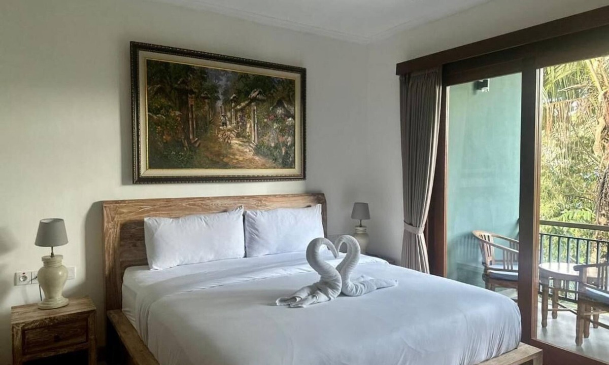 Peliatan Bed & Breakfast | Deluxe Double Room with Balcony at Mandala Home Stay
