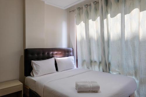 Pagedangan Apartment | Homey 2BR at 1st Floor Asatti Apartment By Travelio
