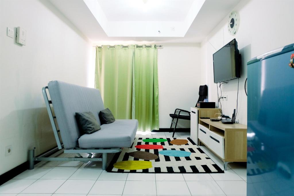 Karet Apartment | Minimalist 1BR with City View The Wave Apartment By Travelio