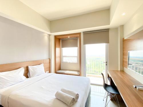 Cikarang Apartment | Minimalist and Homey Studio Apartment at Mustika Golf Residence By Travelio