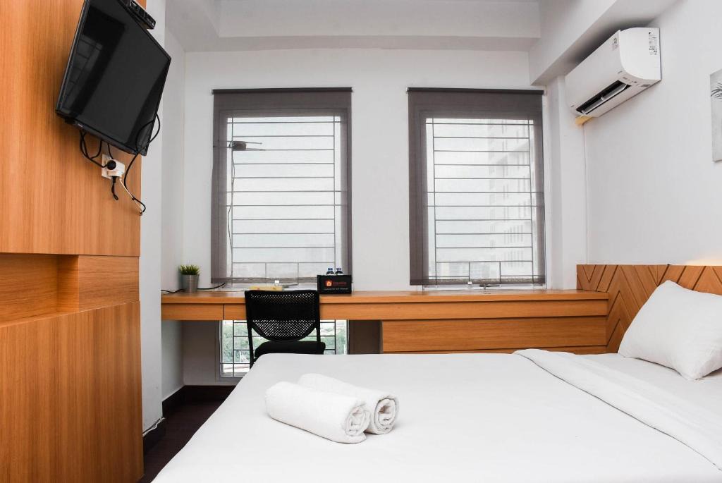 Bekasi Apartment | Pleasant Studio Patraland Urbano Apartment near Station By Travelio