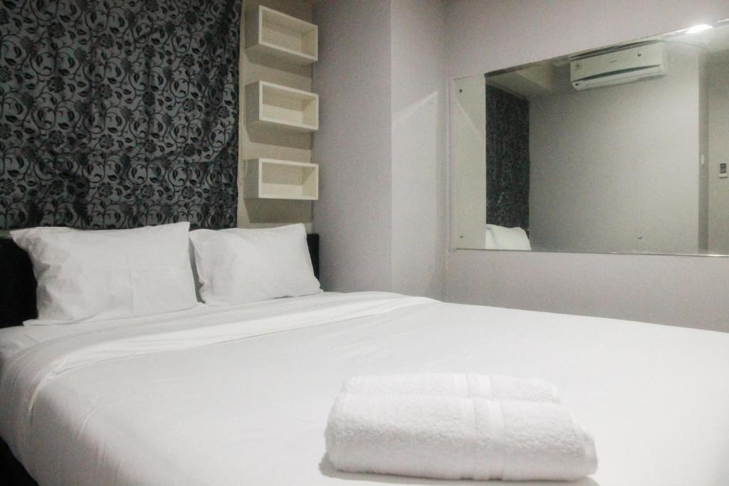 Pancoran Apartment | Simply Minimalist 2BR Apartment at Kalibata City Residence By Travelio
