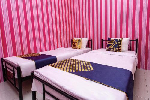 Cilacap Hotel | SPOT ON 2875 Kost Pandawa Syariah