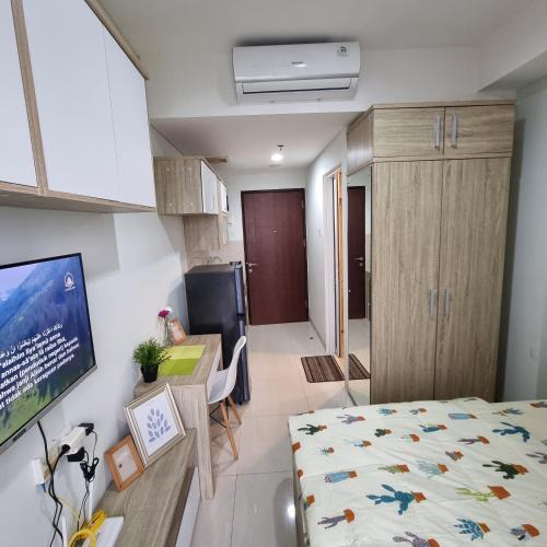 Pinang Apartment | Tentrem Room at Springwood Residence