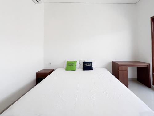 By Pass Ngurah Rai House | Urbanview Hotel Tegal Jinah