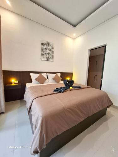 By Pass Ngurah Rai Apartment | Wisman House by Pigeon