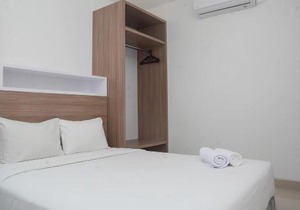 Modern 1BR at Ciputra World 2 Apartment By Travelio