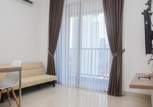 Modern 1BR at Ciputra World 2 Apartment By Travelio