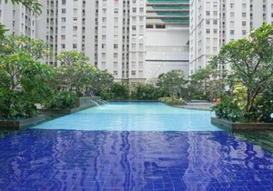 Spacious 2BR Green Bay Pluit Apartment By Travelio