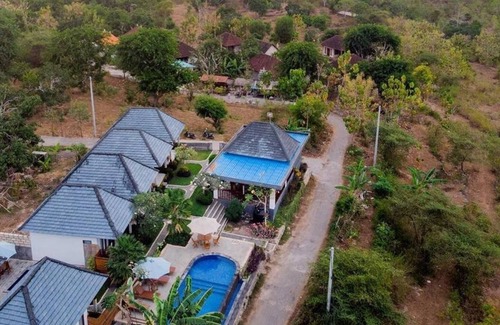 Penida Island Cottage | WK Gamat Garden by WizZeLa ( Deluxe Room )
