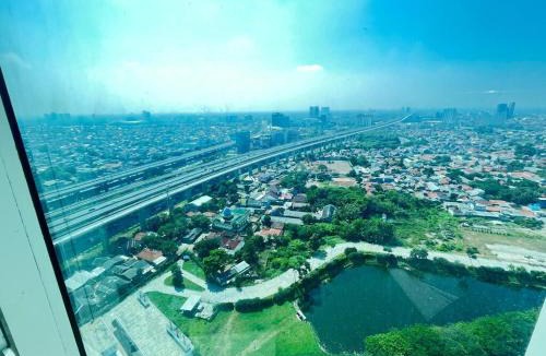 Pekayon Jaya Apartment | Apartemen Grand Kamala Lagoon by Fast Room