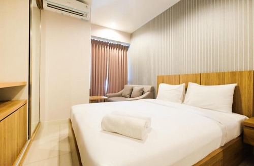 Bekasi Barat Apartment | Best Furnished Studio Grand Kamala Lagoon Apartment By Travelio