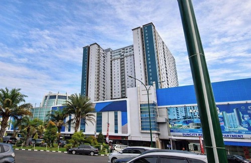 Sidoarjo Apartment | Bright Woody Vibes Studio Room At Suncity Residence Apartment