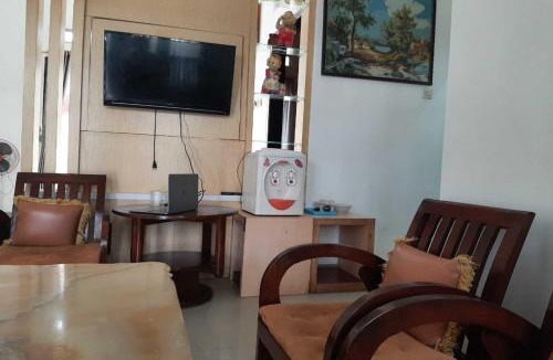 Purwokerto Hotel | Capital O 94246 Rose 50 Homestay