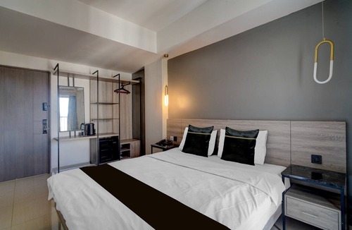 Bendungan Hilir Hotel | Collection O near Stadion Utama Gelora