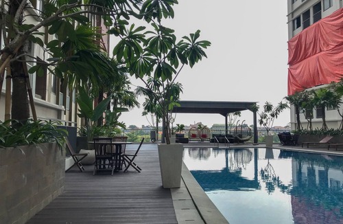Duren Sawit Apartment | Comfortable Pool View Studio Room at LRT City Jatibening Apartment
