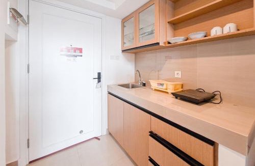 Tangerang Apartment | Cozy Stay and Comfy Studio Loft Kingland Avenue Apartment By Travelio