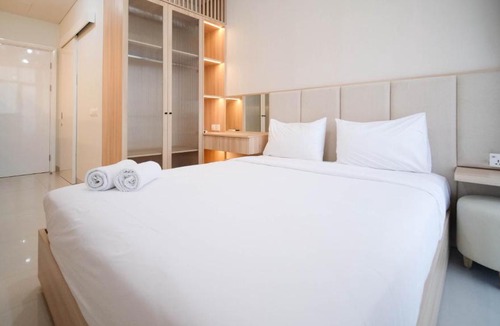 Surabaya Apartment | Cozy Studio Connected to Mall at The Vertu Apartment By Travelio