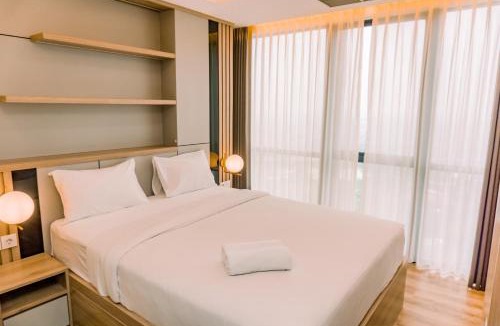Pinang Apartment | Elegant and Comfort 1BR at The Smith Alam Sutera Apartment By Travelio