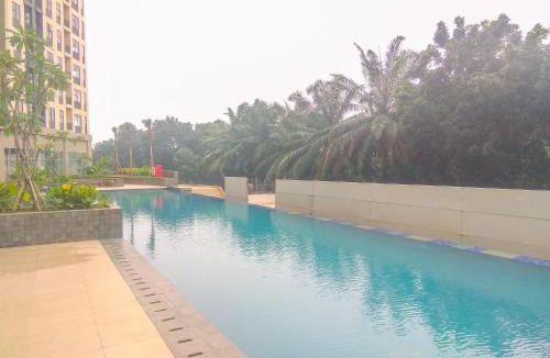 Depok Apartment | Elegant and Comfy 3BR Transpark Cibubur Apartment By Travelio