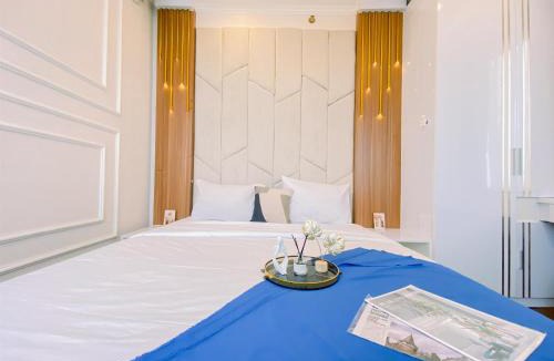 Depok Apartment | Good and Warm 2BR at Transpark Cibubur Apartment By Travelio