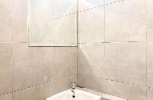 Jatinegara Apartment | Good Deal and Minimalist 1BR at Bassura City Apartment By Travelio