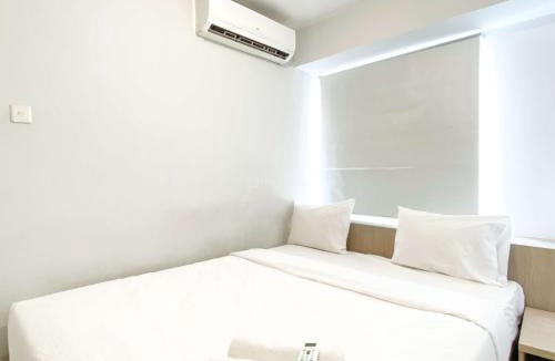 Jatinegara Apartment | Good Deal and Minimalist 1BR at Bassura City Apartment By Travelio