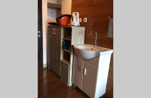 Bekasi Timur Apartment | Grand Dhika Apartement by 2325 Studio room with cozy wooden style room