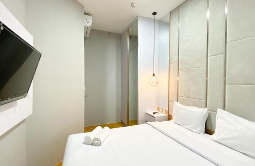 Cikarang Apartment | Homey and Minimalist 1BR Vasanta Innopark Apartment By Travelio