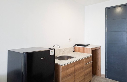 Panunggangan Utara Apartment | Homey Studio Room With City View At Apartment Collins Boulevard