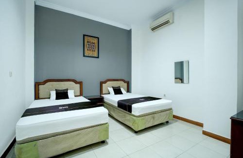 Depok Hotel | Hotel O Depok near Bhayangkara BRIMOB Hospital Formerly Hotel Mutiara Kelapa Dua Depok