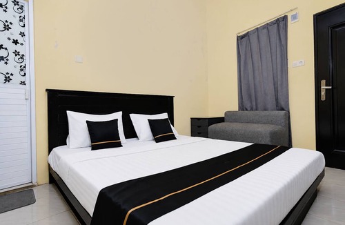 Rajabasa Hotel | Hotel O near Mall Boemi Kedaton 2