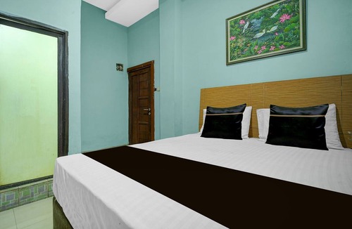 Makassar Hotel | Hotel O near Primaya Hospital formerly