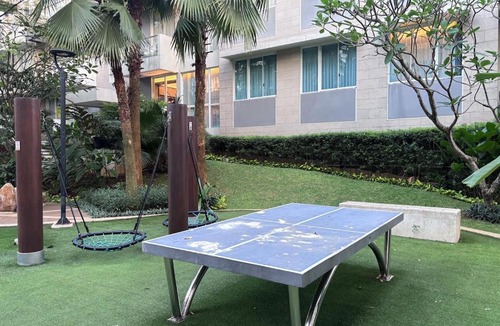 Pagedangan Apartment | Lakeside 2BR Condo Villa Rainbow Spring