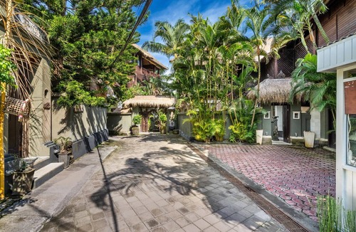 Candi Dasa Apartment | Luxe Double Room with Balcony and Ocean View | The Village of Angels Resort
