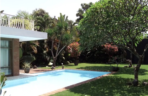 Sunset Road Villa | Midcentury Modern Garden Paradise in the Heart of Seminyak