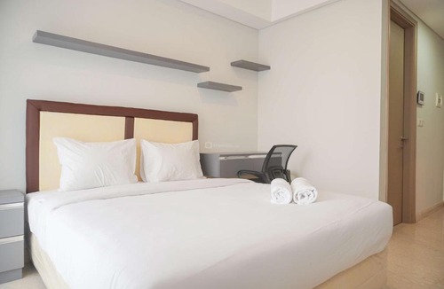 Pantai Indah Kapuk Apartment | Minimalist and Nice Studio at Gold Coast Apartment By Travelio