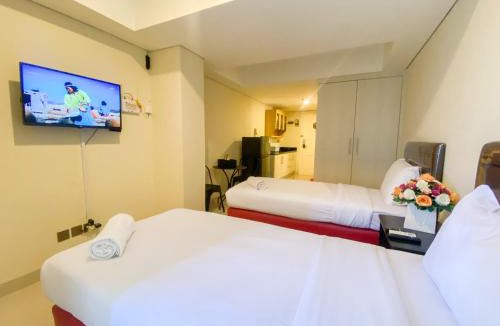 Semarang Apartment | Minimalist Studio Room Marquis de Lafayette Apartment By Travelio