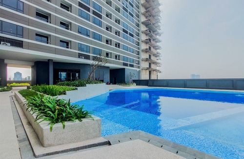 Panunggangan Utara Apartment | Modern Cozy Studio At Apartment Collins Boulevard