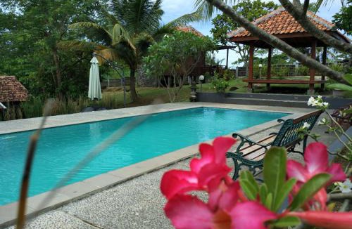 Purbayani House | Negla Beach Villa