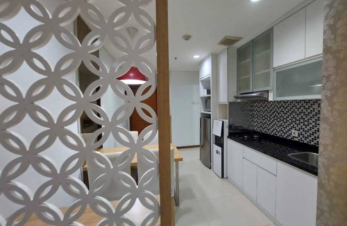 Pluit Condo | Ocean View Cozy 2-bedroom condo with AC in superb North Jakarta.