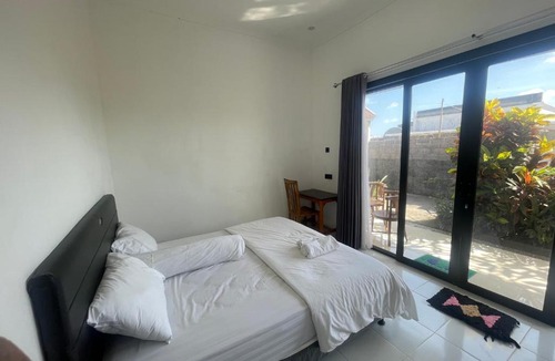 Kutuh Apartment | Orange Guest House room 1