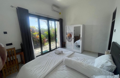 Kutuh Apartment | Orange Guest House room 1