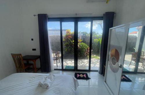Kutuh Apartment | Orange Guest House room 1