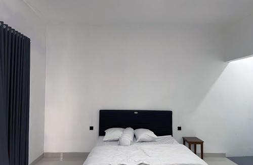 Kutuh House | Orange Guest House room