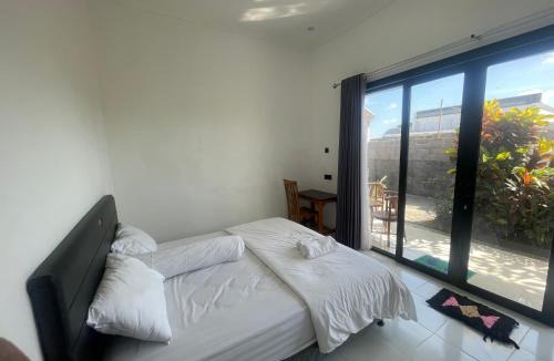Kutuh House | Orange Guest House room